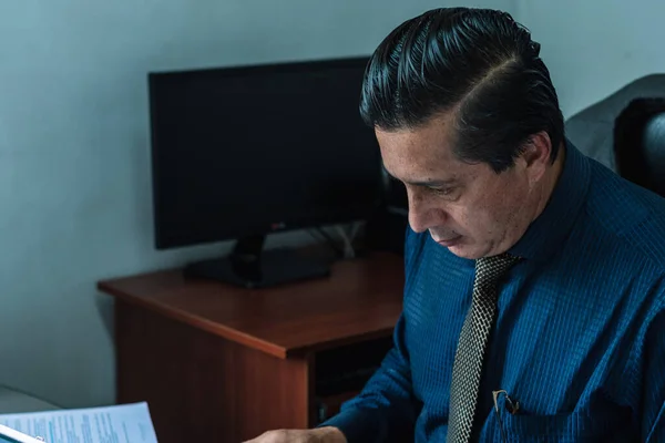 lawyer, office worker searching a document and reading important documents for his job.