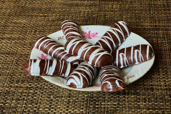 Chocolate Cake Balls Stripped Pink Candy Melts Stacked on Plate