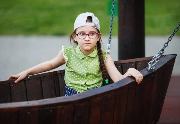 Menina no parque infantil — Fotografia de Stock