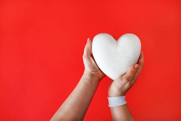 White Heart Female Hands Red Background — Stock Photo, Image