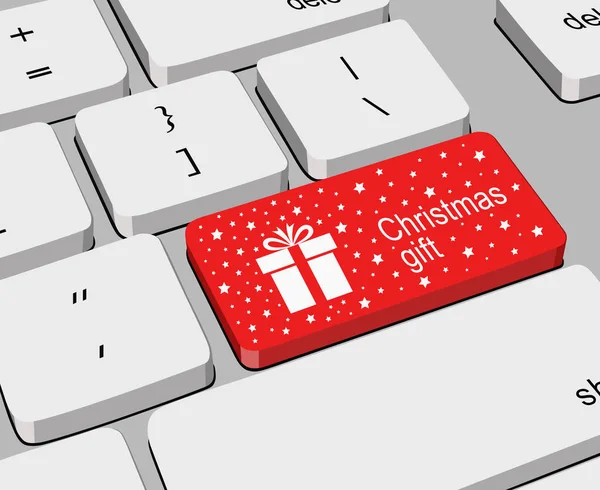 Gri bilgisayar klavye ile kırmızı anahtar ayrıntılarını Noel hediyesi etiketli ve küçük beyaz yıldız ve hediye kutusu simgesi ile işaretlenmiş