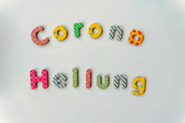 Corona Heilung - Corona şifa, Almanca harflerle tipografi