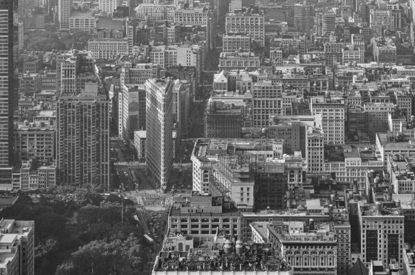 The popular flatiron buliding in New York with the impressive view from above as black and white image,