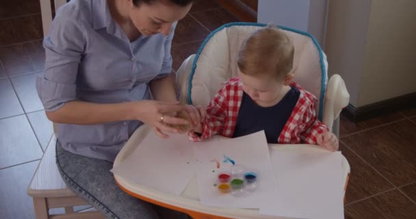 Child Painting Hands Mother Teaches Little Boy Draw — Stok video