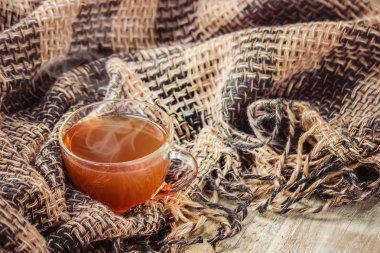 bir fincan çay rahat bir arka plan üzerinde. Seçici odak. Doğa.