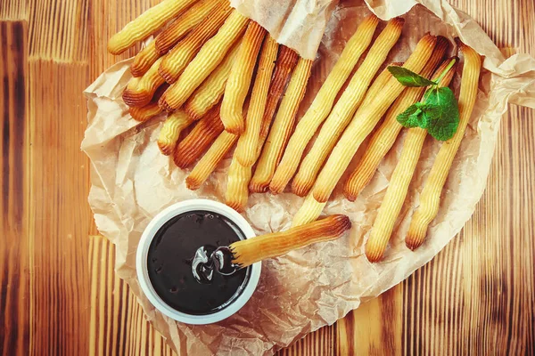 Churros Tillagas Ugnen Med Choklad Selektivt Fokus — Stockfoto