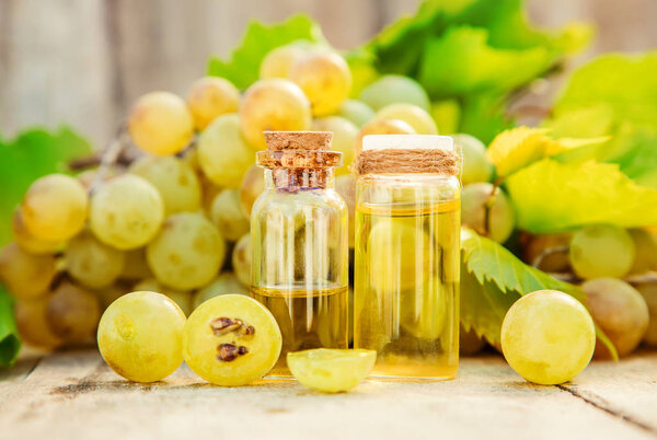 grape seed oil in a small jar. Selective focus. nature.