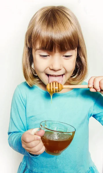 Child Eats Honey Selective Focus Nature Food — Stock Photo, Image