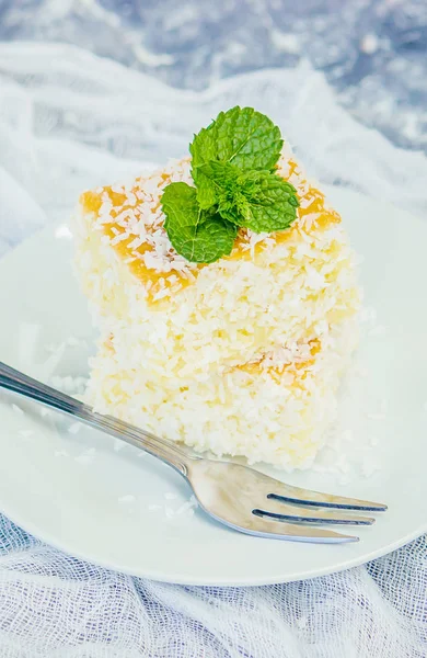 Cakes in coconut shavings. Selective focus. Food. — Stock Photo, Image