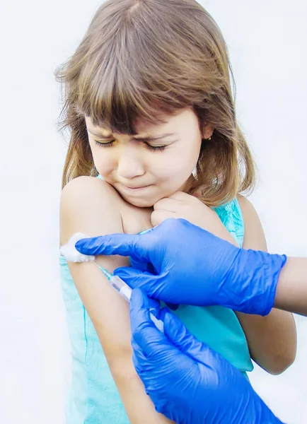 Vaccination of children. An injection. Selective focus. — Stock Photo, Image