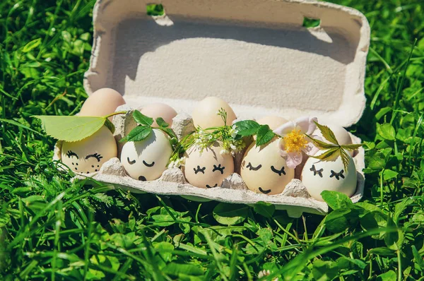 homemade eggs with beautiful faces and a smile. Selective focus.