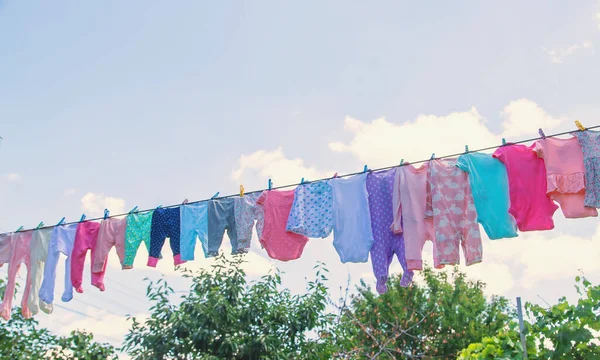 Baby Clothes Drying Street Selective Focus Nature — Stock Photo, Image