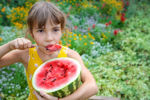 Child Eats Watermelon Spoon Selective Focus — Stock Photo, Image