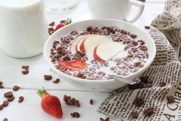 Chocolate balls with milk and fruit. Cereal
