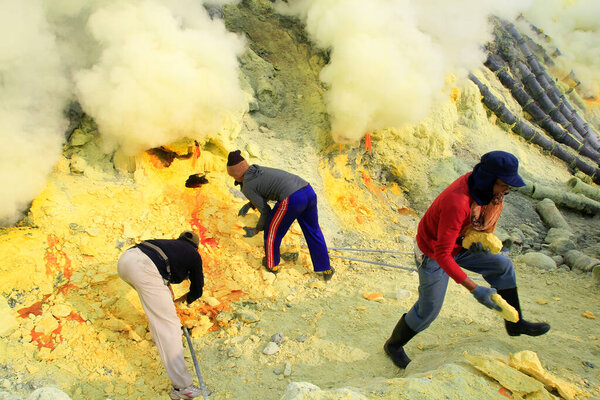 27/05/2015, Banyuwangi, East Java, Indonesia: Sulfur miners in the Ijen crater. The health condition of miners is very risky because it is not equipped with adequate safety standard equipment.