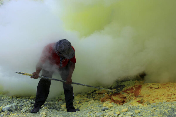 Banyuwangi, Indonesia, May 27, 2015. Sulfur miners in the Ijen crater. The health condition of miners is very risky because it is not equipped with adequate safety standard equipment.