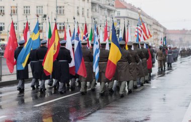 European street, Prague-October 28, 2018: Soldiers of Czech Army are marching on military parade for 100th anniversary of creation Czechoslovakia on October 28, 2018 in Prague, Czech Republic  clipart