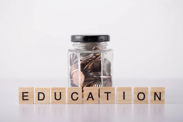 Education Concept Bottle of Coins — Stock Photo, Image