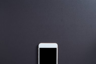 Sarı arka planlı boş akıllı telefon