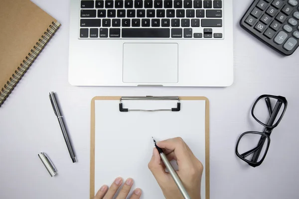 Top View Office Desktop With Hands Of Businessman