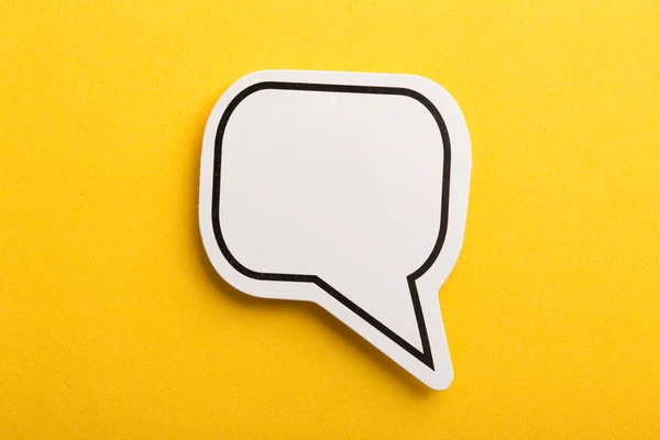 Speech Bubble Isolated On Yellow Background — Stock Photo, Image