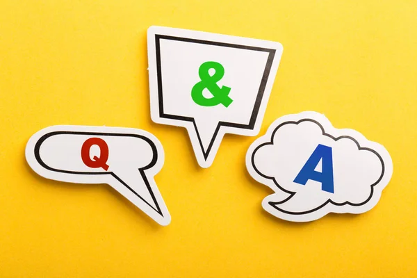 Question And Answer Speech Bubble Isolated On Yellow — Stock Photo, Image