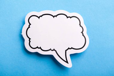 Blank Speech Bubble Isolated On Blue clipart