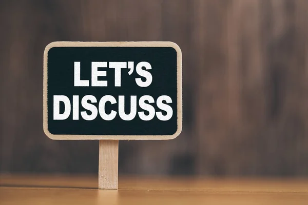 Conceptual Chalkboard Showing Let Us Discuss — Stock Photo, Image