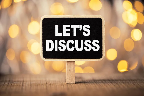 Conceptual Chalkboard Showing Let Us Discuss — Stock Photo, Image