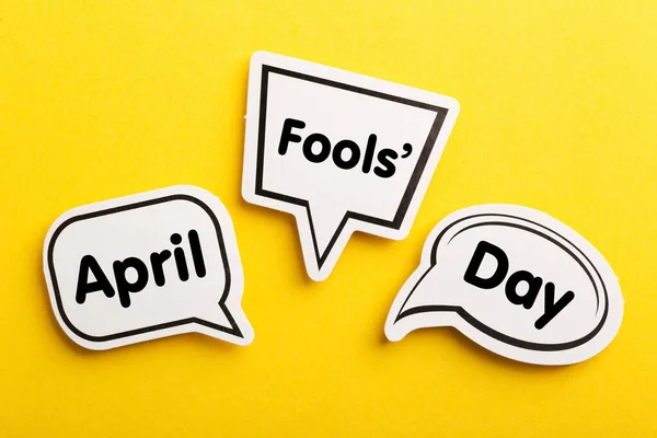 April Speech Bubble Isolated Yellow Background — Stock Photo, Image