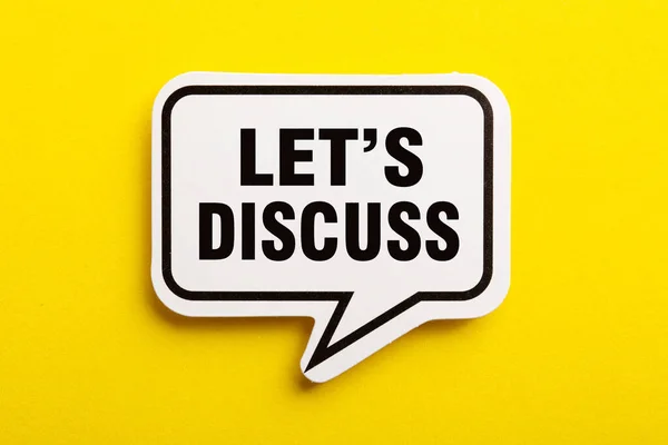 Let Discuss Speech Bubble Isolated Yellow Background — Stock Photo, Image