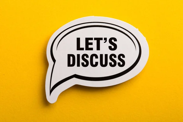 Let Discuss Speech Bubble Isolated Yellow Background — Stock Photo, Image