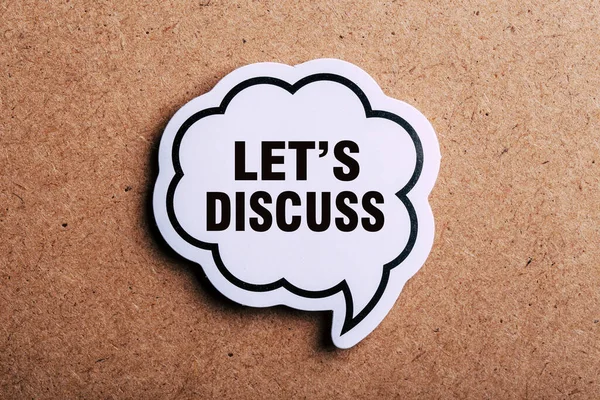 Let Discuss Speech Bubble Isolated Brown Paper Background Shadow — Stock Photo, Image