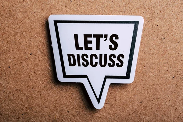 Let Discuss Speech Bubble Isolated Brown Paper Background Shadow — Stock Photo, Image