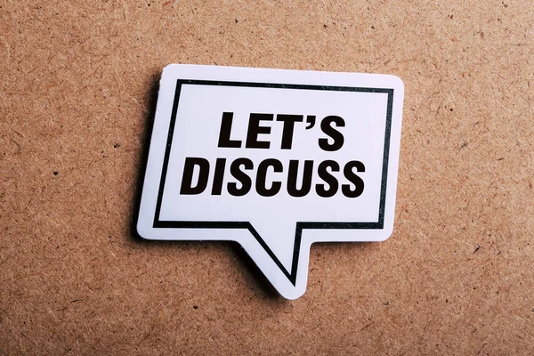 Let Discuss Speech Bubble Isolated Brown Paper Background Shadow — Stock Photo, Image
