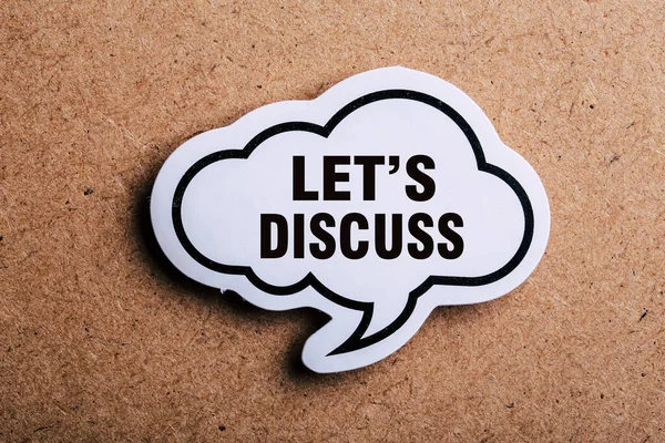 Let Discuss Speech Bubble Isolated Brown Paper Background Shadow — Stock Photo, Image