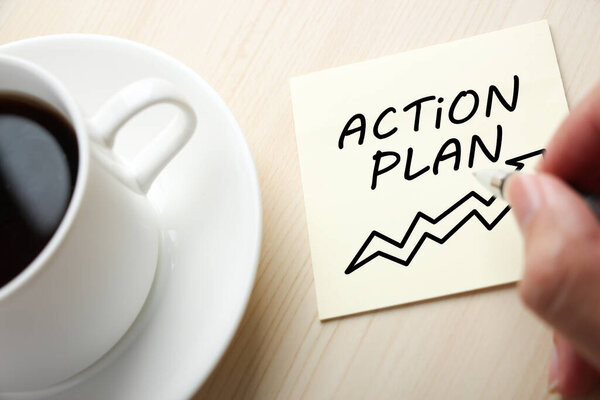 Action Plan concept on the sticky note paper.