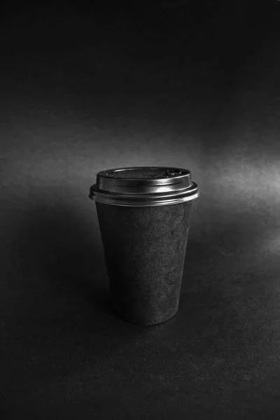 black paper coffee mug on black background, take coffee with you