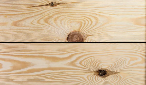 Unpainted pine wood planks with knots. Wood plank texture for your background.
