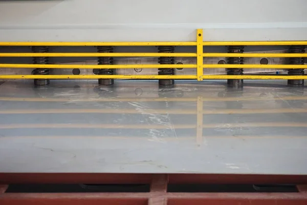 Close Cutting Metal Sheet Machine Working Cut Stainless Steel Plate Stock Photo
