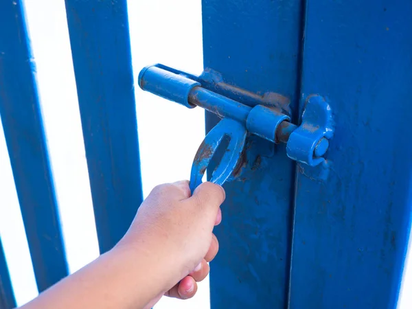 Hand Opening Gate Old Blue Steel Fence — Stock Photo, Image