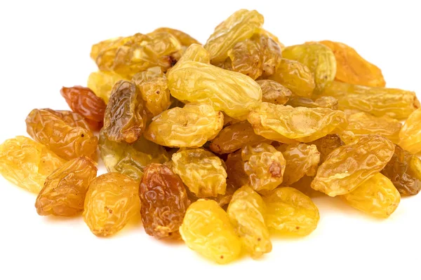 Heap of sun-dried jumbo golden raisins on white plate  closed-up — Stock Photo, Image