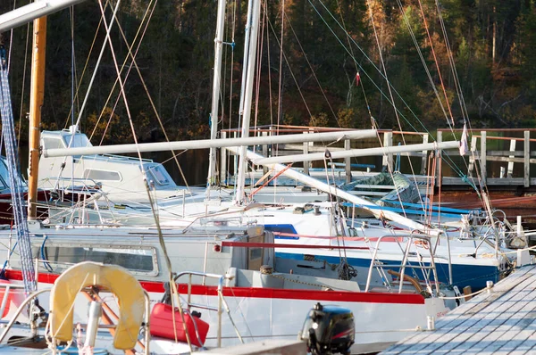 The yacht is parked on the river in the Murmansk region.