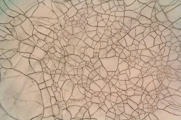 粘土の表面に亀裂をクローズ アップ テクスチャ — ストック写真