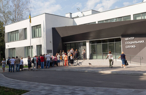 Kiev, Ukraine - June 18, 1018: Line before opening at the building of board of work and social protection of the population of the Svyatoshinsky district of Kiev