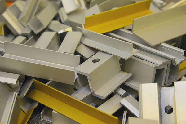 Various aluminum profiles are in bulk. Industry