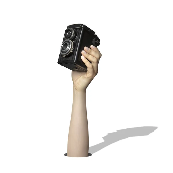 ヴィンテージの古いカメラを持っている手 — ストック写真