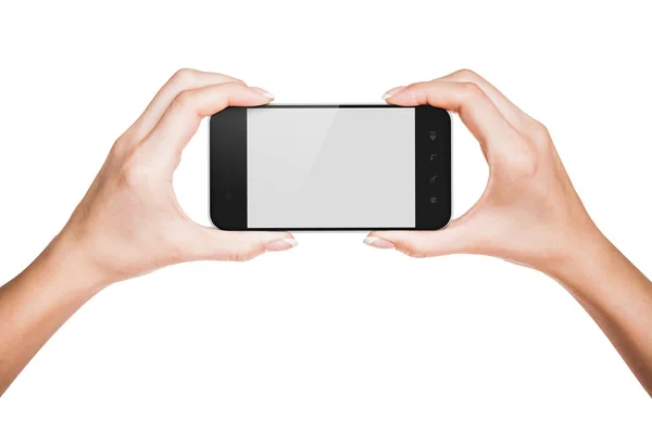 Руки, що тримають мобільний телефон — стокове фото