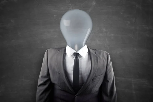 Lightbuld instead of head with businessman body — Stock Photo, Image