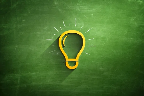 Light bulb icon on blackboard — Stock Photo, Image